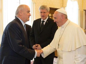 Pope Francis, seen here meeting with Julian Fantino and Prime Minister Stephen Harper, should keep his opinions on climate change to himself, according to one reader. (HANDOUT PHOTO)