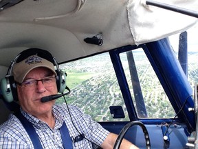 Frontenac Islands Mayor Denis Doyle flies from his home on Wolfe Island to Kingston on Thursday. Doyle uses his small plane to commute to the city several times a week.(Elliot Ferguson/The Whig-Standard)