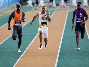(left to right) Gavin Smellie, Andre De Grasse and Aaron Brown in the Men's 100 Metre final at the 2015 Canadian Track and Field Championships at Foote Field, in Edmonton Alta. on Friday July 3, 2015. Andre De Grasse ran a 9.95 to win. David Bloom/Edmonton Sun/Postmedia Network