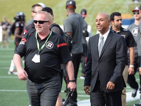 CFL commissioner Jeffrey Orridge walks on the sidelines before the start of CFL between the B.C. Lions and Ottawa Redblack in Ottawa on Saturday July 4, 2015. THE CANADIAN PRESS\Adrian Wyld