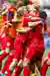 England players celebrate Fara Williams' (4) goal against Germany during a FIFA Women's World Cup 2015 match for third place at Commonwealth Stadium in Edmonton, Alta., on Saturday July 4, 2015. Ian Kucerak/Edmonton Sun/Postmedia Network