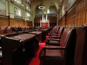 Desks are pictured in the Senate chamber on Parliament Hill in Ottawa September 12, 2014. Parliamentarians will return from their summer break next week. REUTERS/Chris Wattie