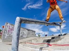 Ashton glade, 13, does a board slide during the Third annual Skate for Spina Bifida and Hydrocephalus at the Castle Downs skateboard park, in Edmonton Alta. on Saturday June 27, 2015. Approximately 50 competitors took part in the event, which hoped to raise over $7,000 for the Spina Bifida and Hydrocephalus Association of Northern Alberta. David Bloom/Edmonton Sun/Postmedia Network