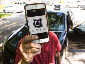 An unidentified veteran Ottawa cab driver has issues with Uber taking away a good portion of his income but says Uber isn't the main reason cab drivers are struggling.
Errol McGihon/Ottawa Sun