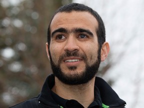Omar Khadr speaks to the media outside his lawyer's west Edmonton home, where he will be staying after being granted parole on May 7, 2015. (David Bloom/Postmedia Network)