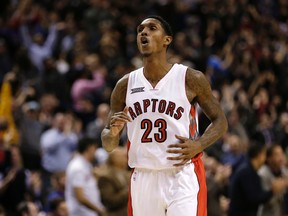 Toronto Raptors guard Lou Williams chants "Lou" along with the fans after hitting a shot during a game at the Air Canada Centre on January 1, 2015. (Craig Robertson/Toronto Sun)