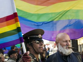 Karicia Ventura, left, and his husband of 12 years, Christopher Linnell, celebrate the United States Supreme Court's landmark decision that legalized same-sex marriage throughout the country in San Francisco, California June 26, 2015. (REUTERS/Elijah Nouvelage)