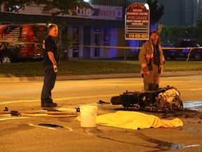 Police at the scene of a fatal collision early Monday, July 6, 2015 at Kipling and Jutland that killed a motorcyclist. (Nick Westoll/Toronto Sun)