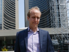 Uber Canada general manager Ian Black leaves City Hall after a meeting with Toronto Mayor John Tory, taxi fleet operators and members of Toronto's Taxi Alliance Monday July 6, 2015. (Stan Behal/Toronto Sun)