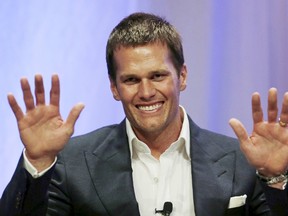 New England Patriots quarterback Tom Brady speaks at Salem State University in Salem, Massachusetts in this file photo from May 7, 2015. Brady, suspended for the first four games next season for his role in 'Deflategate," is expected to formally appealed his penalty May 14, 2015. (REUTERS/Charles Krupa/Pool/Files)