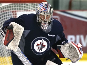 Five games of experience, plus being a spectator during the St. John's IceCaps run to the Calder Cup final in 2014, should serve Eric Comrie well this fall when he is expected to share the net with Connor Hellebuyck on the Manitoba Moose.