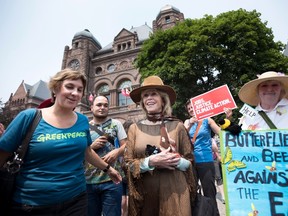 Actress and activist Jane Fonda, centre, joins a climate rally in front of Queen's Park before the Pan American Climate and Economic Summit in Toronto on Sunday, July 5, 2015. THE CANADIAN PRESS/Darren Calabrese