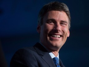 Vancouver Mayor Gregor Robertson is shown in Vancouver, B.C., on Saturday, November 15, 2014. The mayor of Vancouver says he plans on encouraging the Pope to ramp up pressure on national governments across the globe to take action on climate change when he meets with the Catholic leader later this month. THE CANADIAN PRESS/Darryl Dyck