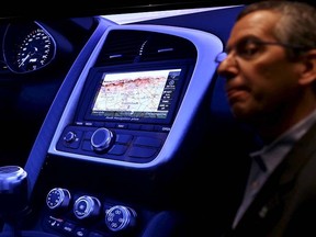 Nvidia's public relations officer Danny Shapiro speaks near an electronic dashboard on a graphic display of an Audi automobile in Santa Clara, Calif., in this Feb. 11, 2015 file photo. REUTERS/Robert Galbraith/Files