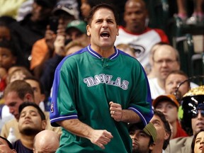 Dallas Mavericks owner Mark Cuban reacts during the second half of their NBA basketball game against the Oklahoma City Thunder in Dallas, Texas in this file photo taken March 17, 2013. (REUTERS)