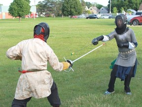 Two members of Sarnia's chapter of the Society for Creative Anachronism show off their fencing skills in Germain Park. 
CARL HNATYSHYN/SARNIA THIS WEEK
