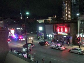 Police cordon off one of two stabbing scenes along Rideau St. on July 1. (Submitted image via Twitter @colinha667)