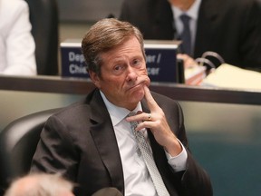 Mayor John Tory listens to councillors at City Hall on Tuesday July 7, 2015. (STAN BEHAL/Toronto Sun)