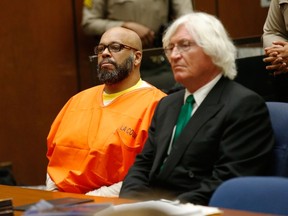 Marion 'Suge' Knight (L) makes a court appearance with his lawyer Thomas Mesereau at Criminal Courts Building on July 7, 2015 in Los Angeles, California. Knight is charged with murder and attempted murder after a hit-and-run incident following an argument in a parking lot January 29, 2015.  David Buchan/Getty Images/AFP