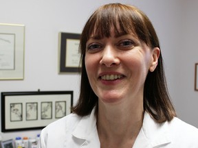 Doctor of naturopathy Donna Reid is pictured in her Sarnia office. The 22-year practitioner of naturopathy says she's thrilled with the official establishment of the College of Naturopaths of Ontario earlier this month. (Tyler Kula/Sarnia Observer/Postmedia Network)