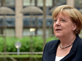 Germany's Chancellor Angela Merkel arrives at a euro zone EU leaders emergency summit on the situation in Greece, in Brussels, Belgium, July 7, 2015. (REUTERS/Eric Vidal)