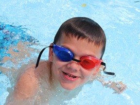 Six-year-old Lachlan Stewart swims in the Kinsmen pool Tuesday afternoon. The city reopened the pool to the public after a three-year closure.