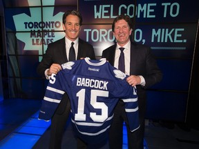 Toronto Maple Leafs president Brendan Shanahan, left, welcomes Mike Babcock as the team’s new head coach at a news conference on May 21. Another piece of good news for the Leafs, according to columnist Spencer Rice, is that the team has yet to lose a game this offseason.
(Craig Robertson/Postmedia Network)