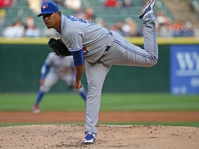 Starting pitcher Felix Doubront of the Toronto Blue Jays delivers the ball against the Chicago White Sox at U.S. Cellular Field on July 7, 2015. (Jonathan Daniel/Getty Images/AFP)