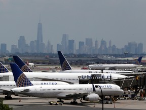 In this Tuesday, July 22, 2014, file photo, United Airlines jets are parked on the tarmac at Newark Liberty International Airport, in Newark, N.J. All United Continental flights in the U.S. were grounded Wednesday morning, July 8, 2015, due to computer problems. United said in a statement that it is working to resolve the problems, which are related to “network connectivity.” (AP Photo/Julio Cortez, File)