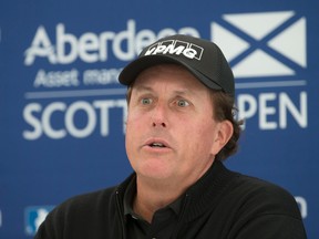 US golfer Phil Mickelson answers questions from the media during a preview day ahead of the Scottish Open at Gullane Golf Club, Gullane Scotland Wednesday July 8, 2015. Five-time major champion Phil Mickelson has refused to comment on allegations linking him to an illegal gambling operation, saying he had got used to being an “object to be discussed.” Speaking Wednesday ahead of the Scottish Open, Mickelson says “the fact is I’m comfortable enough with who I am as a person that I don’t feel I need to comment on every little report that comes out.” (Kenny Smith/PA via AP)