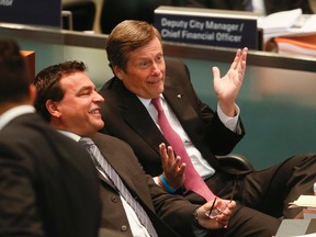 Toronto City Councillor George Mammoliti and Mayor John Tory during the casino debate at City Hall on Wednesday July 8, 2015. (Stan Behal/Toronto Sun)