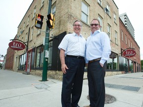 Bob Schram of Sterling Marking (left) has sold virtually an entire city block to Joel McLean of Info-Tech in London. (DEREK RUTTAN, The London Free Press)