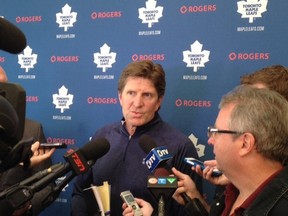 Head coach Mike Babcock speaks to reporters at Maple Leafs camp in Collingwood, Ont., yesterday. (Lance Hornby/Toronto Sun)