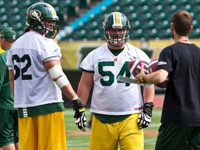 OL Alexander Krausnick, centre, shown here at a  2013 practice, said he enjoyed playing for the RedBlacks last season but he's happy to be back with the Eskimos. (Codie Mclachlan, Edmonton Sun)