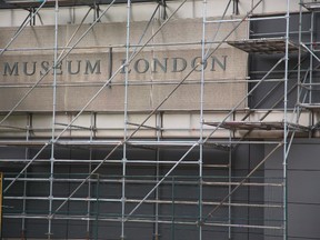 Museum London is surrounded by scaffolding and netting for $1.2 million in roof repairs, which will be completed by fall. (MIKE HENSEN, The London Free Press)
