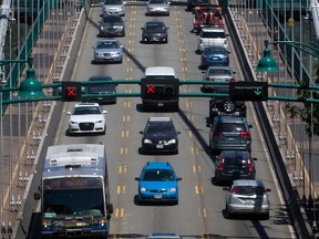 A transit bus crosses over the Lions Gate Bridge from North Vancouver into Vancouver last week. Vancouverites voted 62% against raising the provincial sales tax within their region to generate funds for transit expansion. (Canadian Press photo)