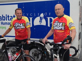 St. Thomas teacher Evert TenBruggencate, left, joins his brother Pieter in a group of 50 riders cycling from Niagara Falls to Winnipeg in the Habitat for Humanity Cycle of Hope 1,600-km fundraising ride.