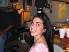 In this image released by A24 Films, singer Amy Winehouse appears in a scene from the film, "Amy." (A24 Films via AP)
