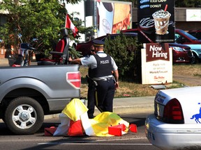 RCMP investigates a accident involving a woman in a scooter and a bus on Sherwood Drive and Main Blvd. in Sherwood Park, Alberta on Thursday July 9, 2015. Perry Mah/Edmonton Sun