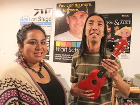 Yessica Rivera Belsham, left, and Winston Vinh, at the H'art Centre in Kingston, Ont. on Thurs., July 9, 2015, are the teachers for a new musical program for seniors at the centre. Michael Lea/The Whig-Standard/Postmedia Network