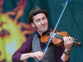 Gordie MacKeeman of Gordie MacKeeman & His Rhythm Boys performs as Sunfest 2015 opened Thursday at Victoria Park. (DEREK RUTTAN, The London Free Press)