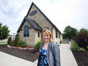 Laura Owen is co-owner of The Springs Restaurant, which was converted from a crumbling church to an eatery during a three-year renovation costing more than $1 million. (DEREK RUTTAN, The London Free Press)