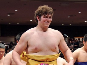 Canadian sumo wrestler Brodik Henderson, whose ring name is Homarenishiki, is hoping his prowess in the remote world of U.S. amateur sumo wrestling will translate into a professional career in the heartland of Japan's ancient sport. (Kyodo News via AP)