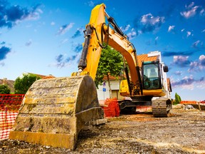 A backhoe, which is a piece of excavating equipment, caused $15K in damage to a highway in New Brunswick. (Fotolia)