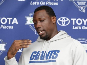 Giants defensive end Jason Pierre-Paul talks to reporters during training camp in East Rutherford, N.J., on July 24, 2014. (Seth Wenig/AP Photo/Files)