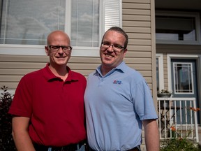 Ken Ross, right, and his husband of almost 10 years, David McDonagh, outside their home in Stony Plain on Sunday, July 5. - Yasmin Mayne, Reporter/Examiner