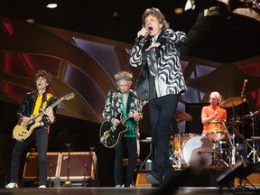 Mick Jagger and the Rolling Stones perform at Comerica Park, Wednesday, July 8, 2015, in Detroit. The band plays Ralph Wilson Stadium in Buffalo Saturday night.  (Daniel Mears/Detroit News via AP)