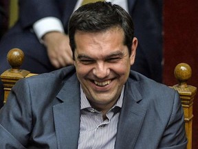 Greek Prime Minister Alexis Tsipras takes part in discussions at the Greek Parliament in Athens on July 10, 2015. Lawmakers in Greece are to vote whether to back a last-ditch reform plan the government submitted to creditors overnight in a bid to stave off financial collapse and exit from the Eurozone. Greece's international creditors believe its latest debt proposals are positive enough to be the basis for a new bailout worth 74 billion euros, an EU source said June 10.  AFP PHOTO / ANDREAS SOLARO