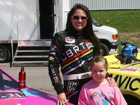 Erica Thiering poses with Ava Warrington, the young racing fan who dreamed up the special design for Thiering's car. (Gary Grant, Canada's Best Racing Team)