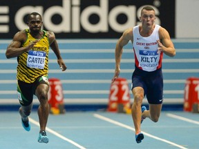 Nesta Carter, left, is the world's sixth-fastest man in the 100m. (Reuters)